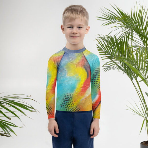 all-over-print-kids-rash-guard-white-front-68a89ea9121d6.jpg Kids Rash Guard (UPF 50+) - "Red Rasta"
